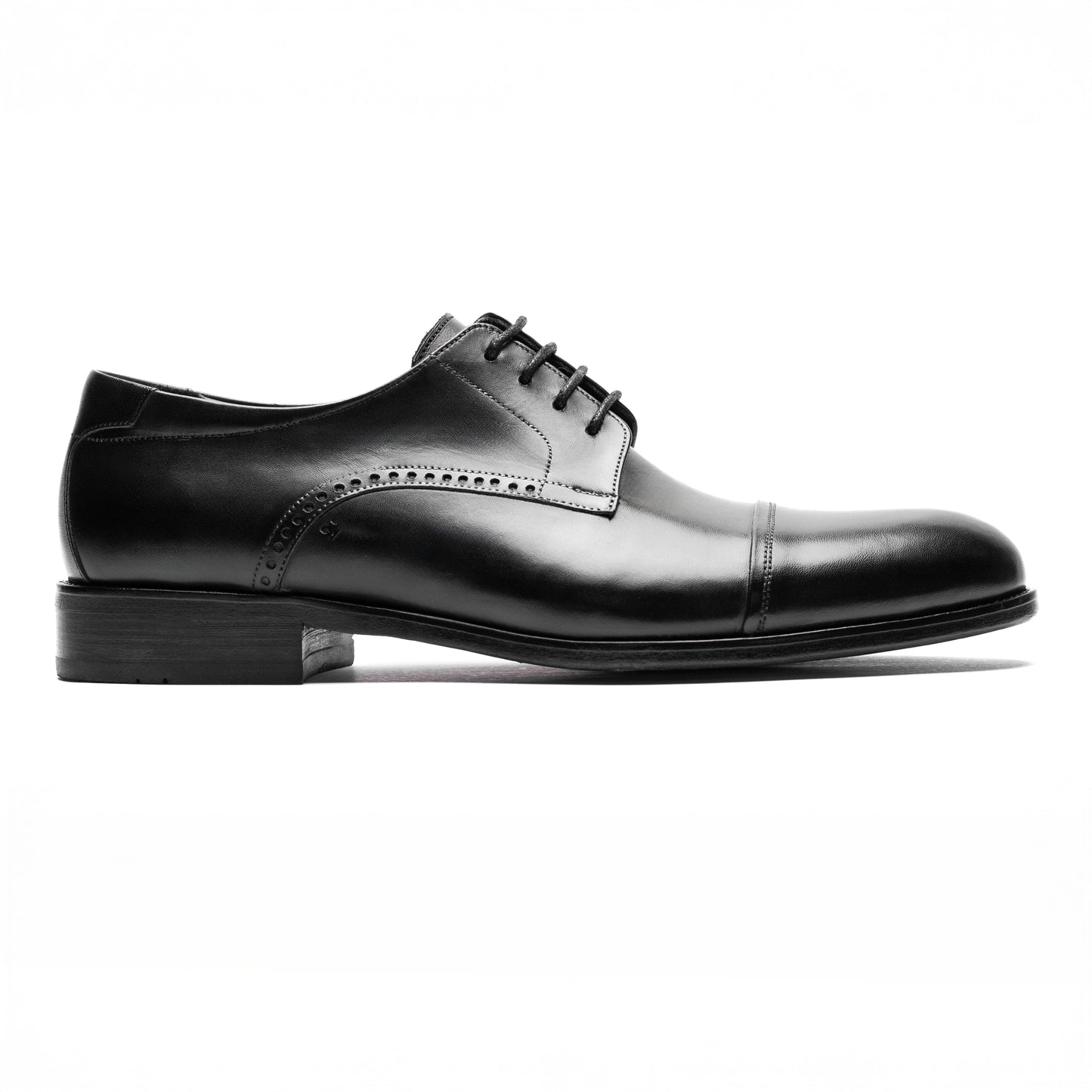 Side profile of the Cap Toe Derby Black shoe, showcasing the sleek full-grain leather and classic stitching