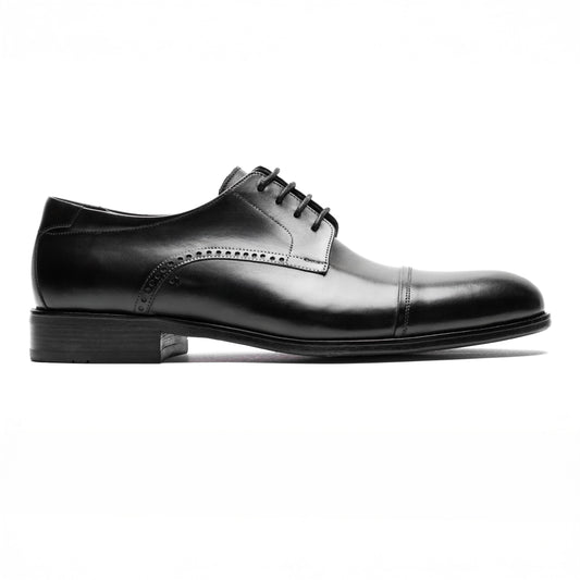 Side profile of the Cap Toe Derby Black shoe, showcasing the sleek full-grain leather and classic stitching