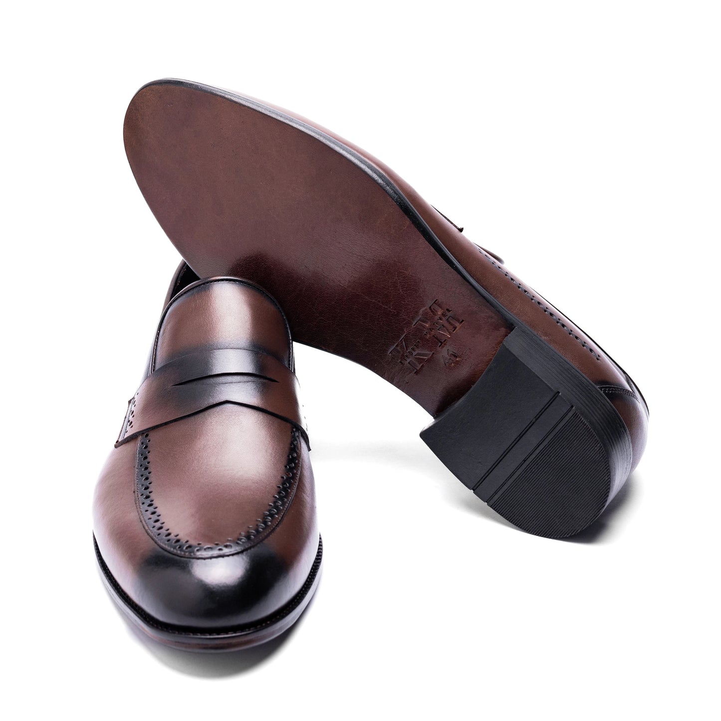 Un Aldric Step Brown penny loafer styled with smart-casual outfit