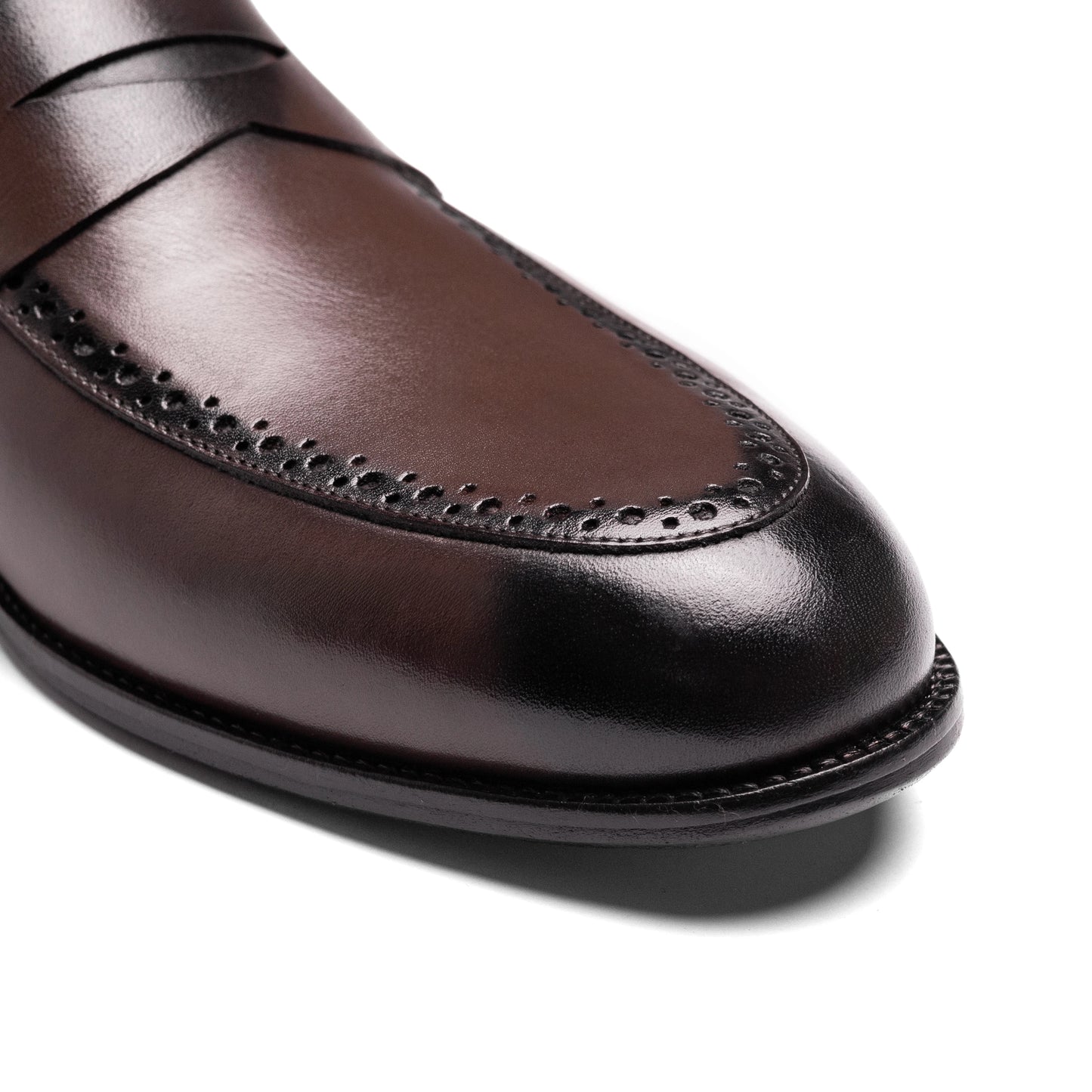Durable rubber sole of Un Aldric Step Brown penny loafer