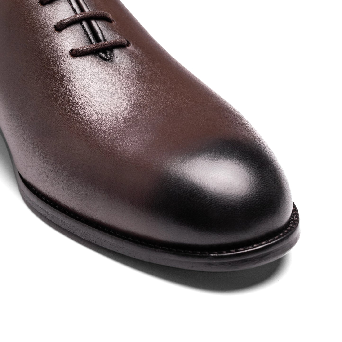 Valencia Wholecut Brown styled with suit trousers for a classic look