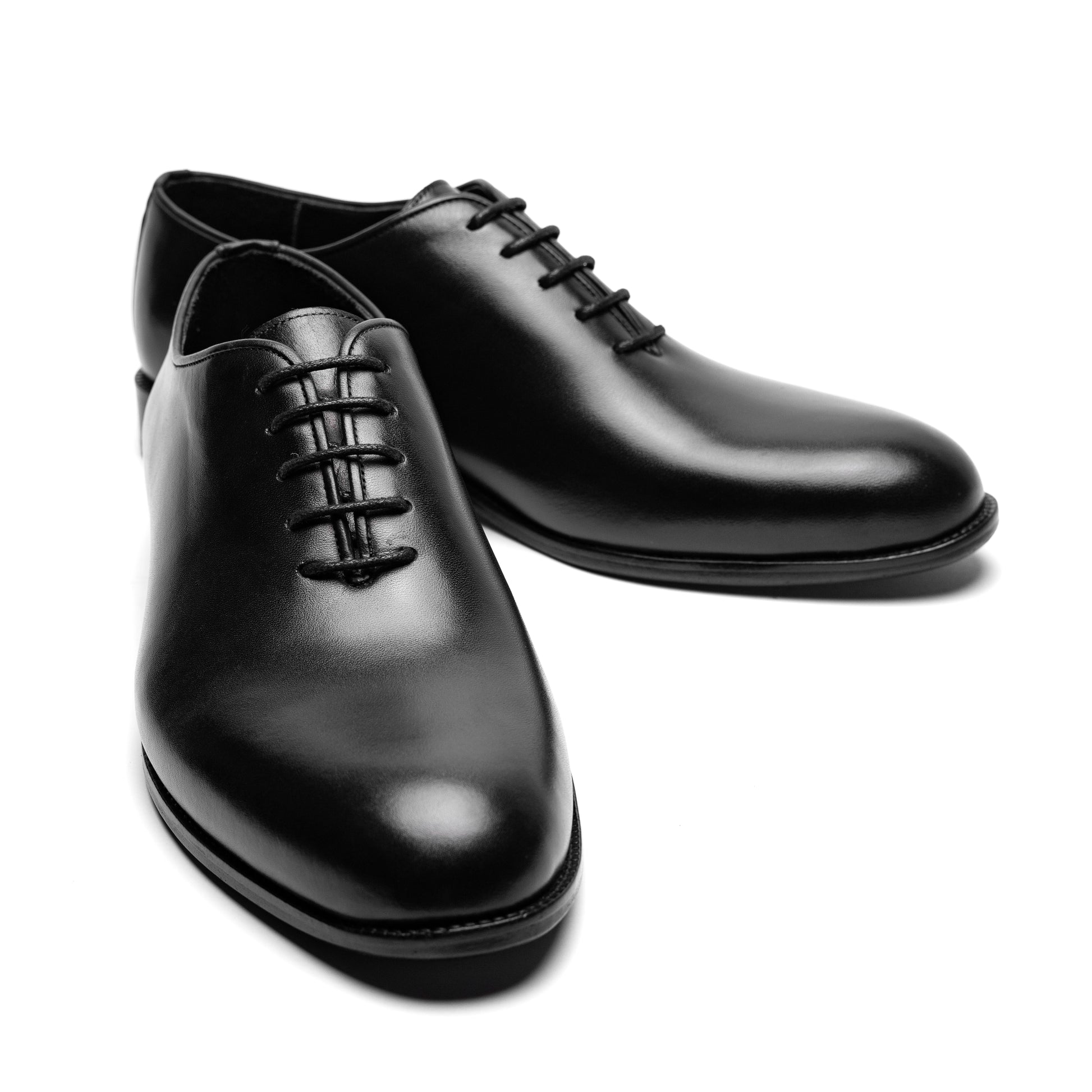 Valencia Wholecut Black – formal black dress shoes for men, clean toe line and minimalist design