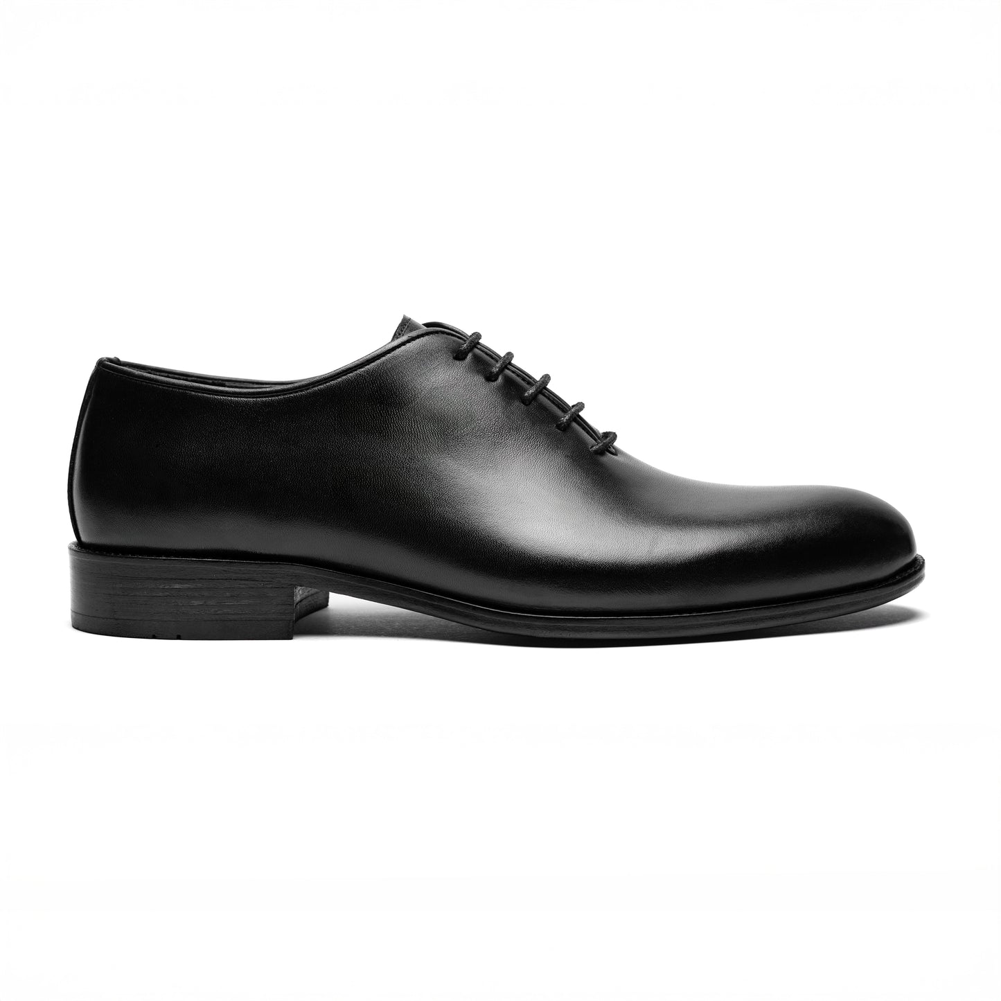 Valencia Wholecut Black – handmade black leather wholecut shoes for men, elegant side profile