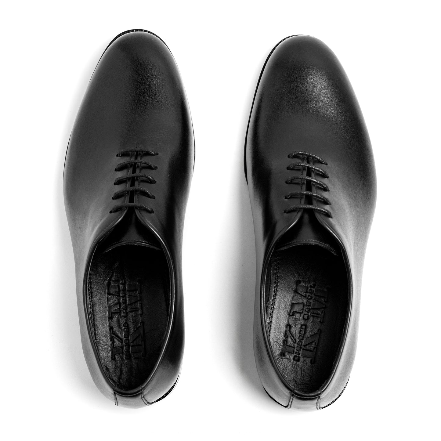 Valencia Wholecut Black – top-down view of luxury wholecut shoe in smooth black full-grain leather
